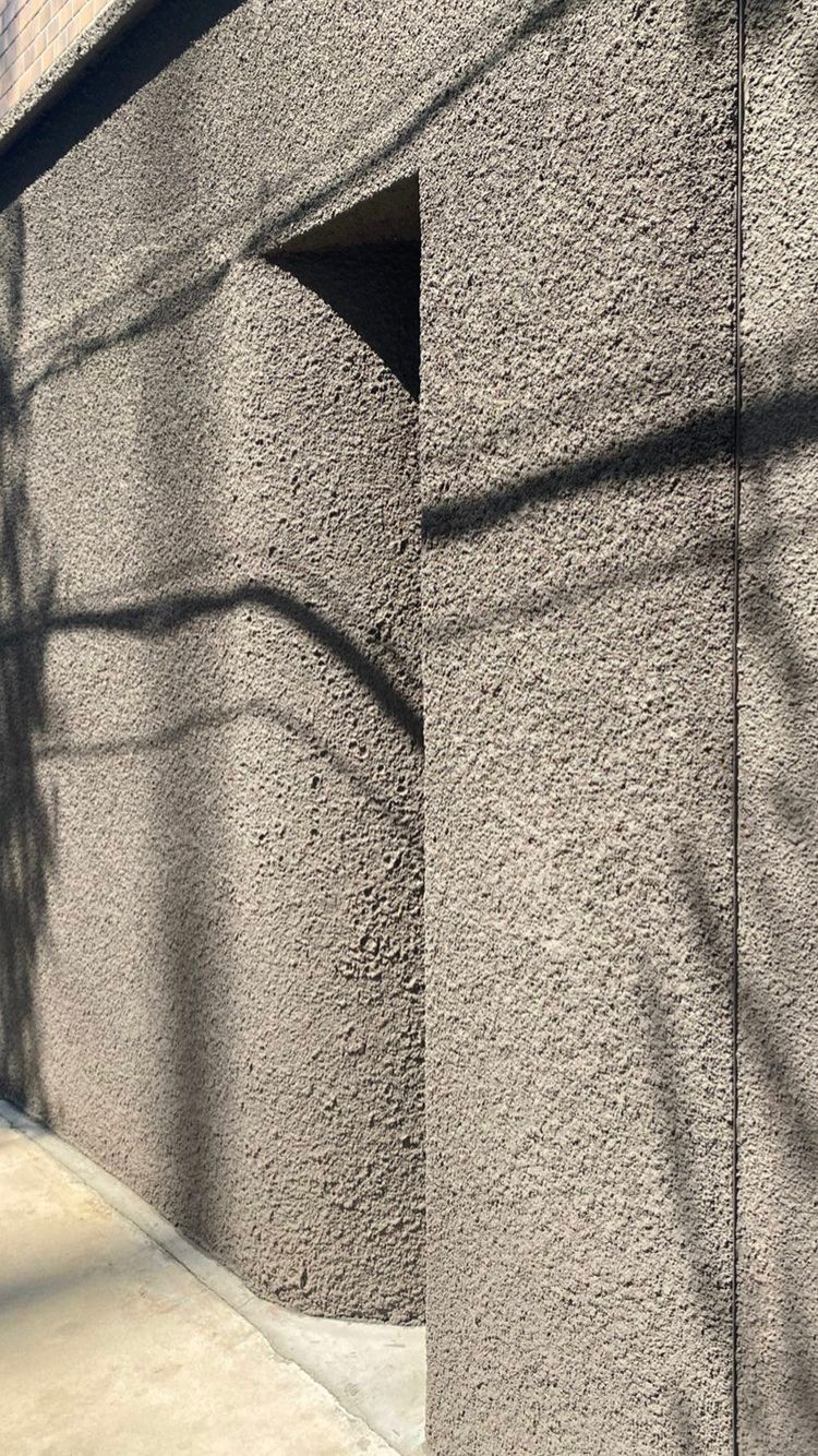 Earth tone render wall with shadows