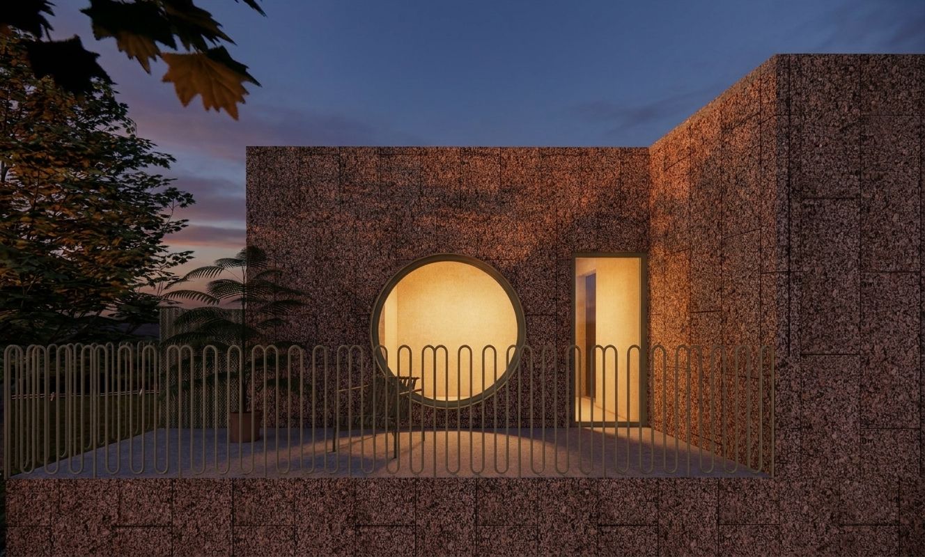 Roof terrace with round window at dusk